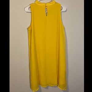 Bright yellow mini dress.